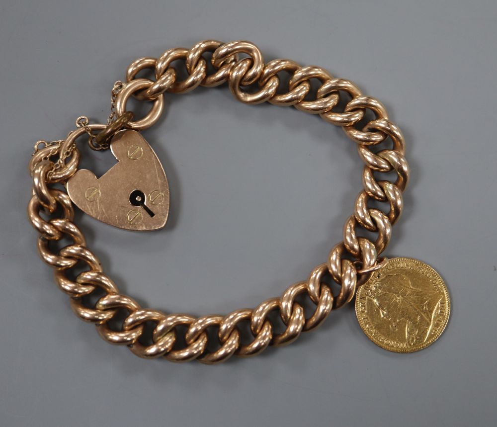An early 20th century 9ct curblink bracelet, hung with an 1899 gold half sovereign,